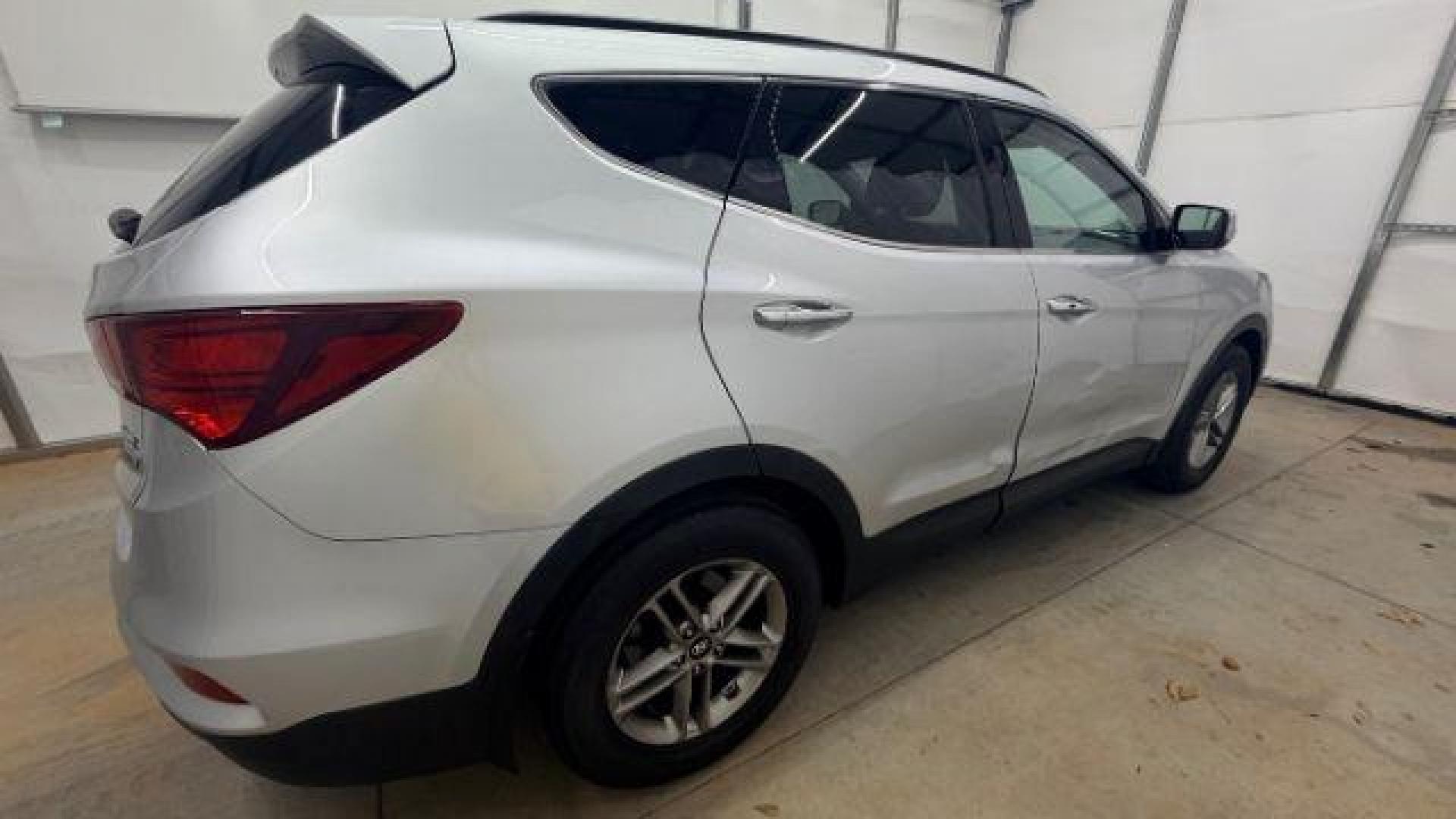 2018 Silver Hyundai Santa Fe Sport 2.4L (5XYZUDLB5JG) with an Theta II 2.4L I-4 gasoline direct injection engine, located at 1806 Veterans Memorial Hwy SW, Austell, GA, 30168, (770) 944-9558, 33.817959, -84.606987 - Photo#6