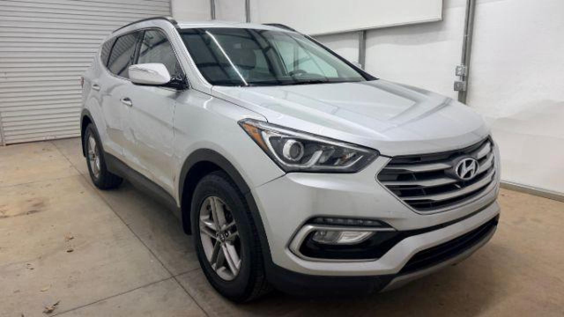 2018 Silver Hyundai Santa Fe Sport 2.4L (5XYZUDLB5JG) with an Theta II 2.4L I-4 gasoline direct injection engine, located at 1806 Veterans Memorial Hwy SW, Austell, GA, 30168, (770) 944-9558, 33.817959, -84.606987 - Photo#8