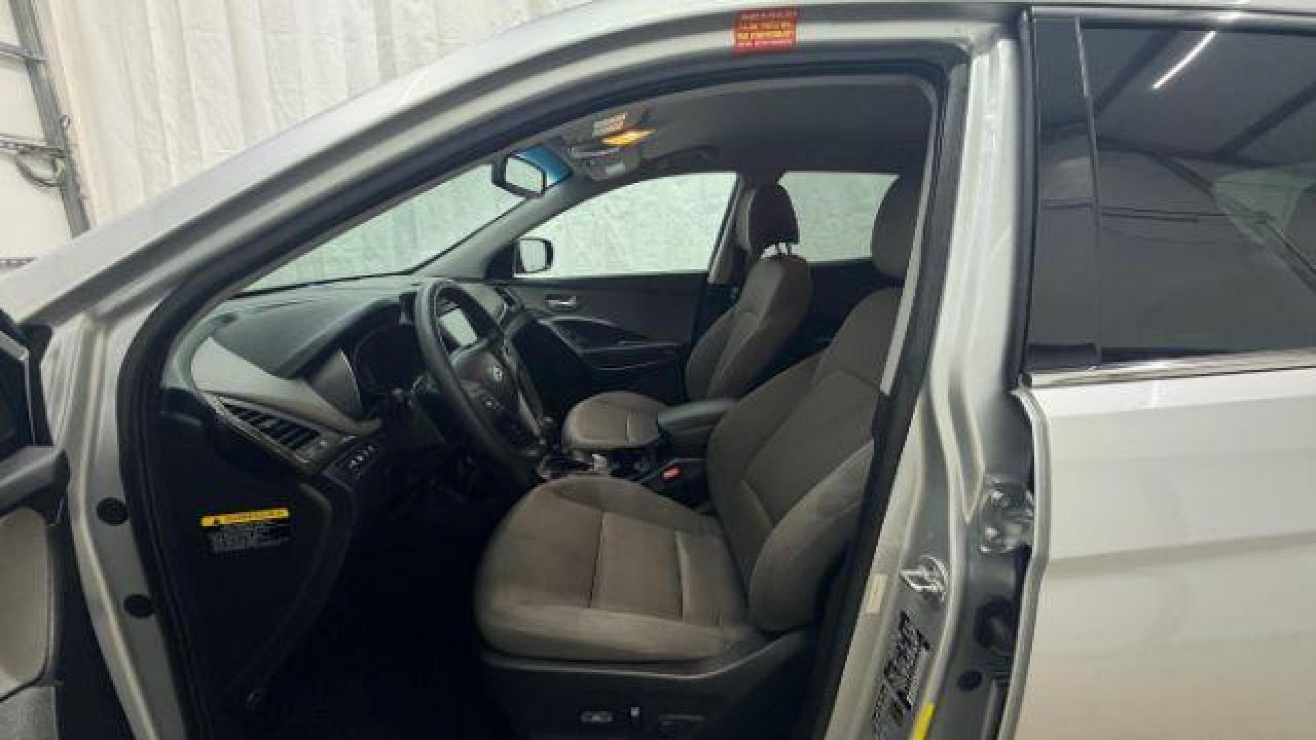 2018 Silver Hyundai Santa Fe Sport 2.4L (5XYZUDLB5JG) with an Theta II 2.4L I-4 gasoline direct injection engine, located at 1806 Veterans Memorial Hwy SW, Austell, GA, 30168, (770) 944-9558, 33.817959, -84.606987 - Photo#11