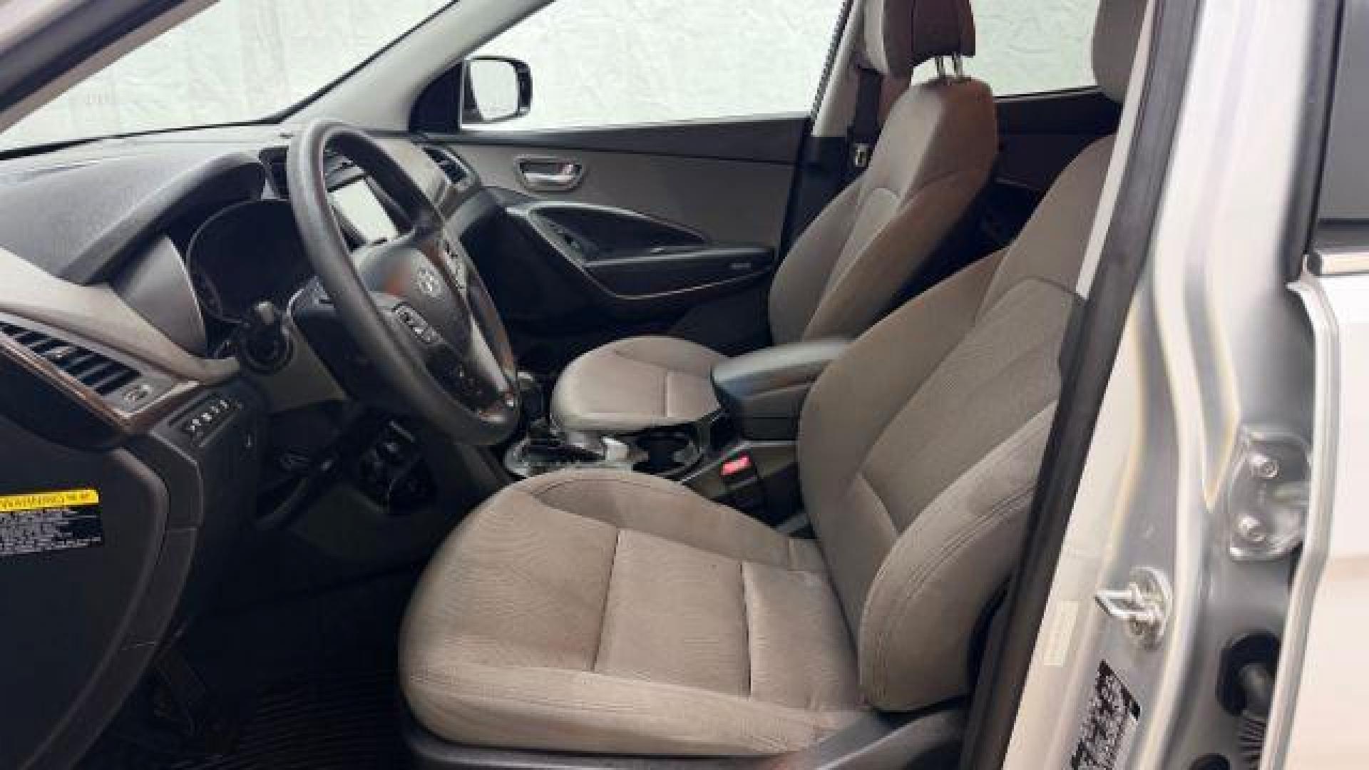 2018 Silver Hyundai Santa Fe Sport 2.4L (5XYZUDLB5JG) with an Theta II 2.4L I-4 gasoline direct injection engine, located at 1806 Veterans Memorial Hwy SW, Austell, GA, 30168, (770) 944-9558, 33.817959, -84.606987 - Photo#12