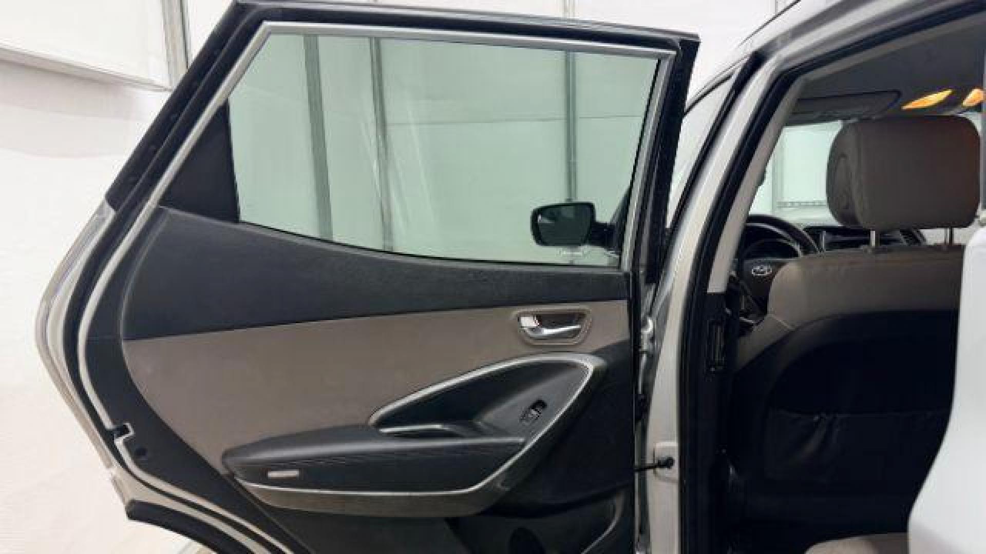 2018 Silver Hyundai Santa Fe Sport 2.4L (5XYZUDLB5JG) with an Theta II 2.4L I-4 gasoline direct injection engine, located at 1806 Veterans Memorial Hwy SW, Austell, GA, 30168, (770) 944-9558, 33.817959, -84.606987 - Photo#13