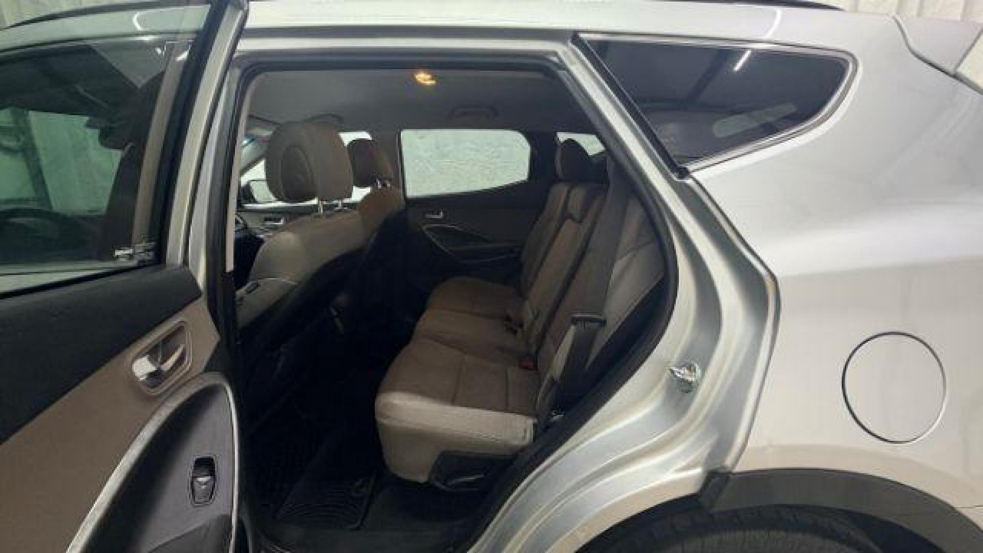 2018 Silver Hyundai Santa Fe Sport 2.4L (5XYZUDLB5JG) with an Theta II 2.4L I-4 gasoline direct injection engine, located at 1806 Veterans Memorial Hwy SW, Austell, GA, 30168, (770) 944-9558, 33.817959, -84.606987 - Photo#14