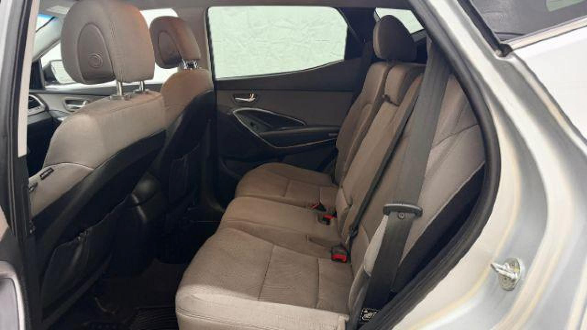 2018 Silver Hyundai Santa Fe Sport 2.4L (5XYZUDLB5JG) with an Theta II 2.4L I-4 gasoline direct injection engine, located at 1806 Veterans Memorial Hwy SW, Austell, GA, 30168, (770) 944-9558, 33.817959, -84.606987 - Photo#15