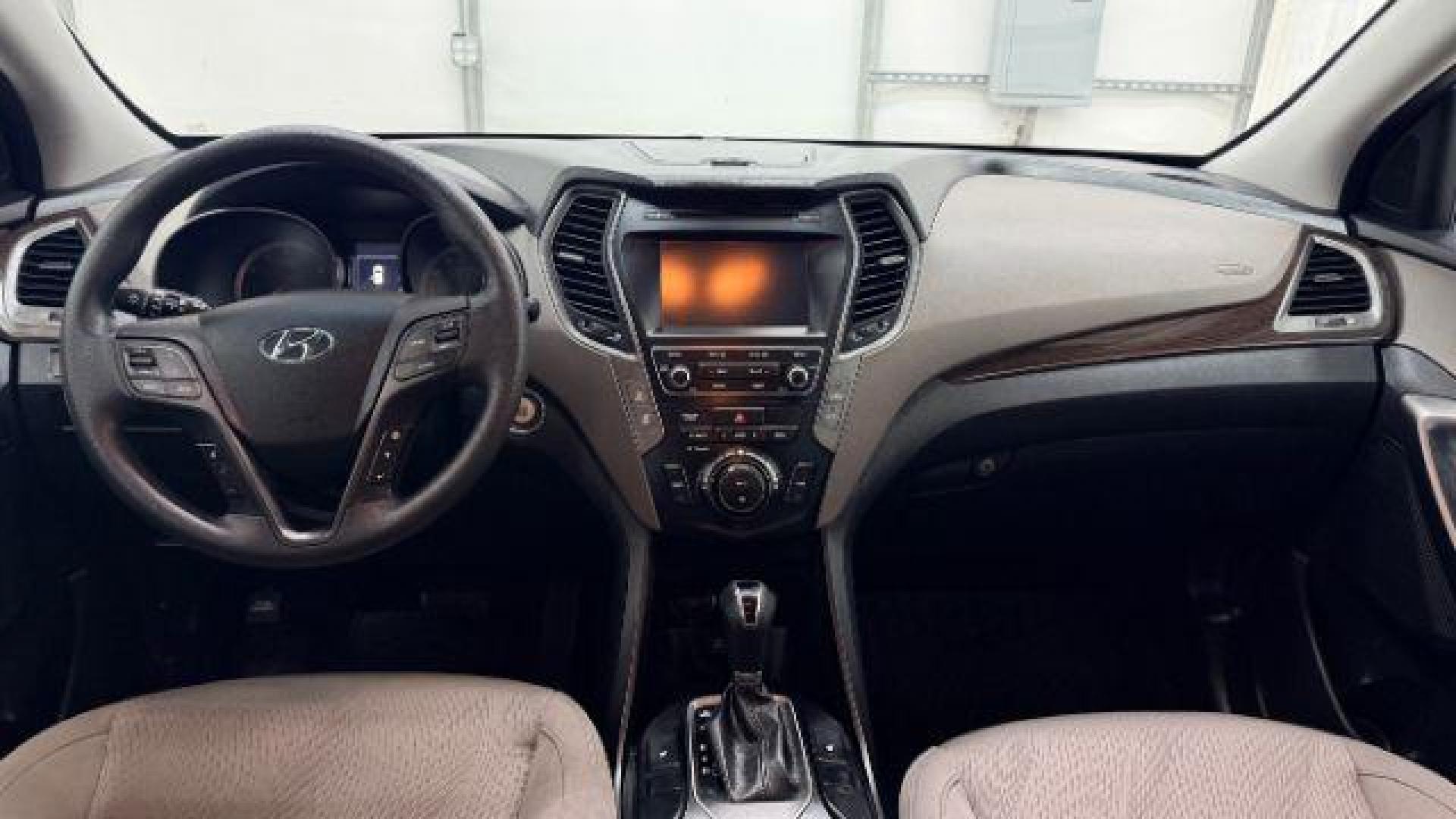 2018 Silver Hyundai Santa Fe Sport 2.4L (5XYZUDLB5JG) with an Theta II 2.4L I-4 gasoline direct injection engine, located at 1806 Veterans Memorial Hwy SW, Austell, GA, 30168, (770) 944-9558, 33.817959, -84.606987 - Photo#16