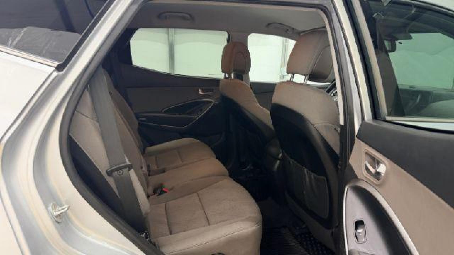 2018 Silver Hyundai Santa Fe Sport 2.4L (5XYZUDLB5JG) with an Theta II 2.4L I-4 gasoline direct injection engine, located at 1806 Veterans Memorial Hwy SW, Austell, GA, 30168, (770) 944-9558, 33.817959, -84.606987 - Photo#17