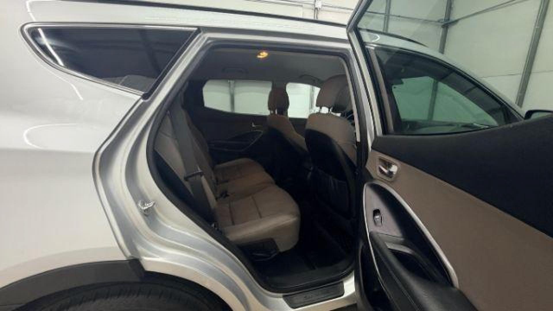 2018 Silver Hyundai Santa Fe Sport 2.4L (5XYZUDLB5JG) with an Theta II 2.4L I-4 gasoline direct injection engine, located at 1806 Veterans Memorial Hwy SW, Austell, GA, 30168, (770) 944-9558, 33.817959, -84.606987 - Photo#18