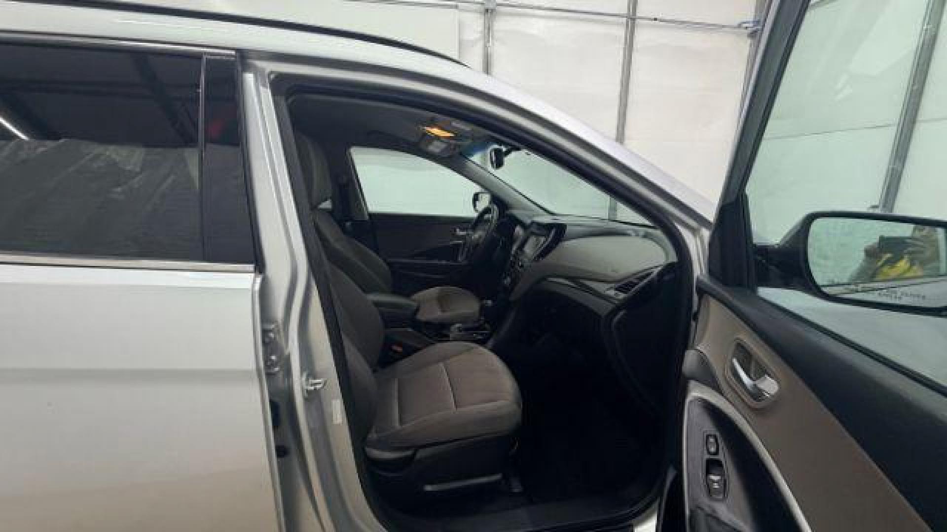 2018 Silver Hyundai Santa Fe Sport 2.4L (5XYZUDLB5JG) with an Theta II 2.4L I-4 gasoline direct injection engine, located at 1806 Veterans Memorial Hwy SW, Austell, GA, 30168, (770) 944-9558, 33.817959, -84.606987 - Photo#21