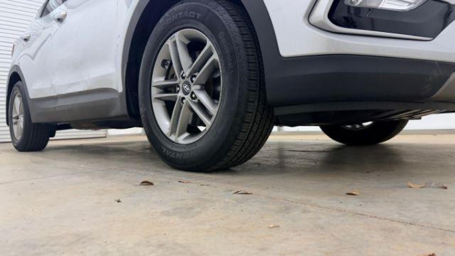 2018 Silver Hyundai Santa Fe Sport 2.4L (5XYZUDLB5JG) with an Theta II 2.4L I-4 gasoline direct injection engine, located at 1806 Veterans Memorial Hwy SW, Austell, GA, 30168, (770) 944-9558, 33.817959, -84.606987 - Photo#22