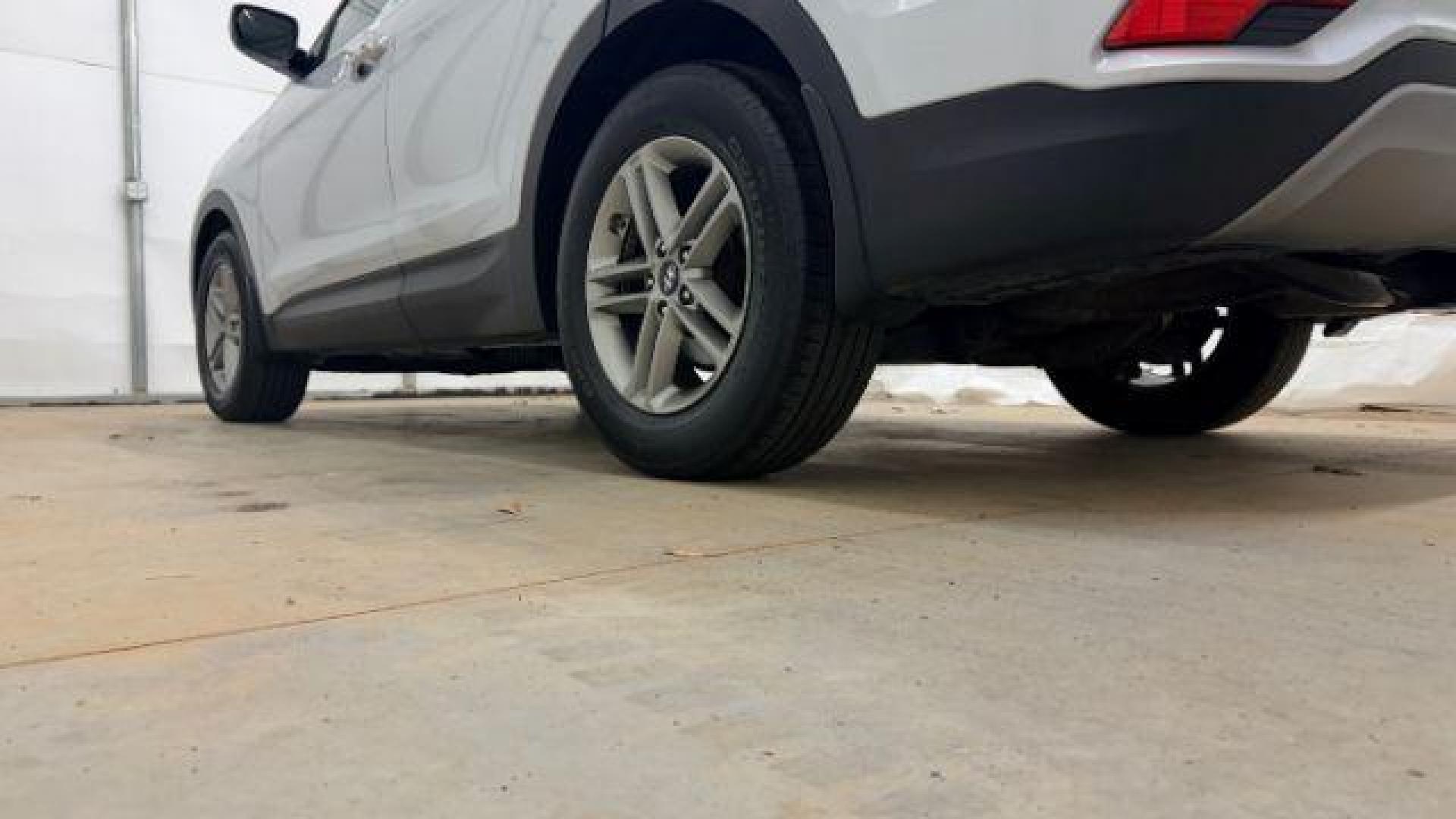 2018 Silver Hyundai Santa Fe Sport 2.4L (5XYZUDLB5JG) with an Theta II 2.4L I-4 gasoline direct injection engine, located at 1806 Veterans Memorial Hwy SW, Austell, GA, 30168, (770) 944-9558, 33.817959, -84.606987 - Photo#24