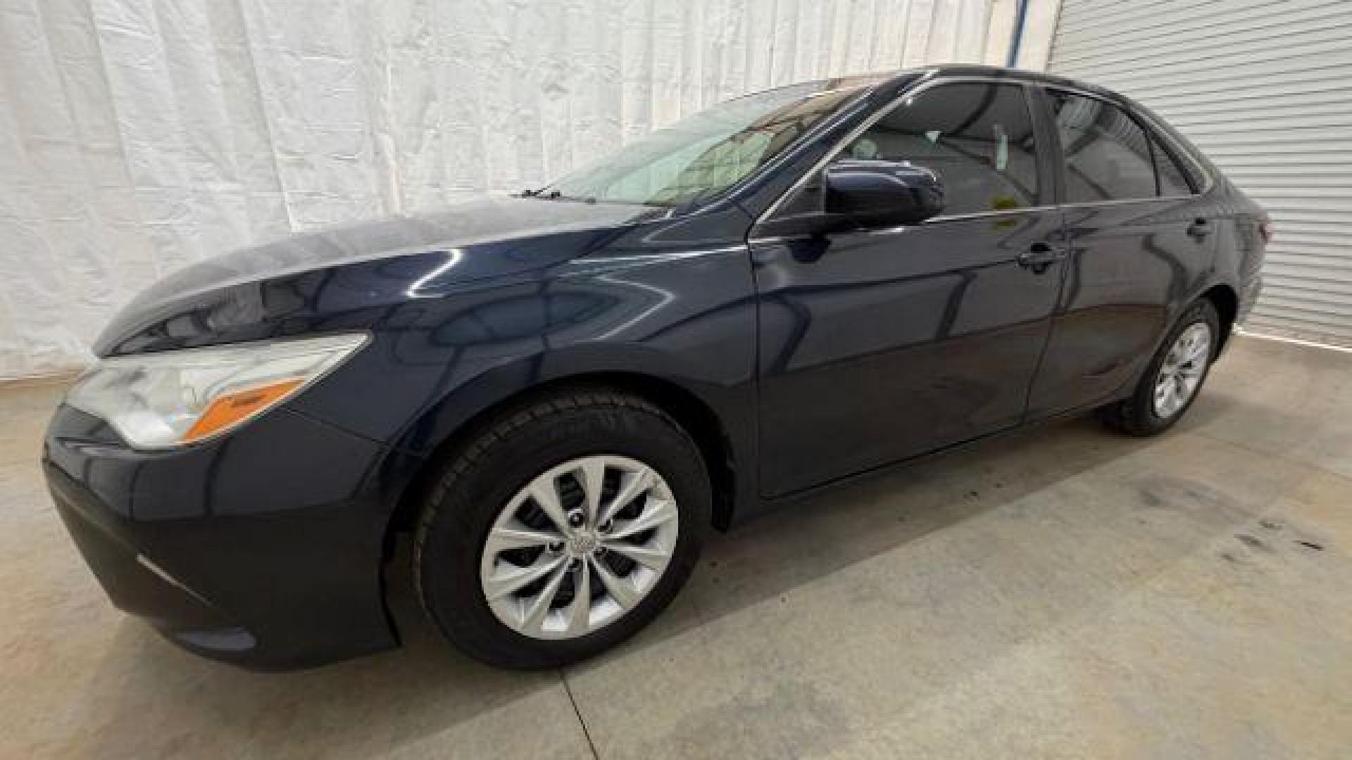 2017 Blue Toyota Camry LE (4T1BF1FKXHU) with an 2.5L I-4 DOHC engine, located at 1806 Veterans Memorial Hwy SW, Austell, GA, 30168, (770) 944-9558, 33.817959, -84.606987- Photo#1