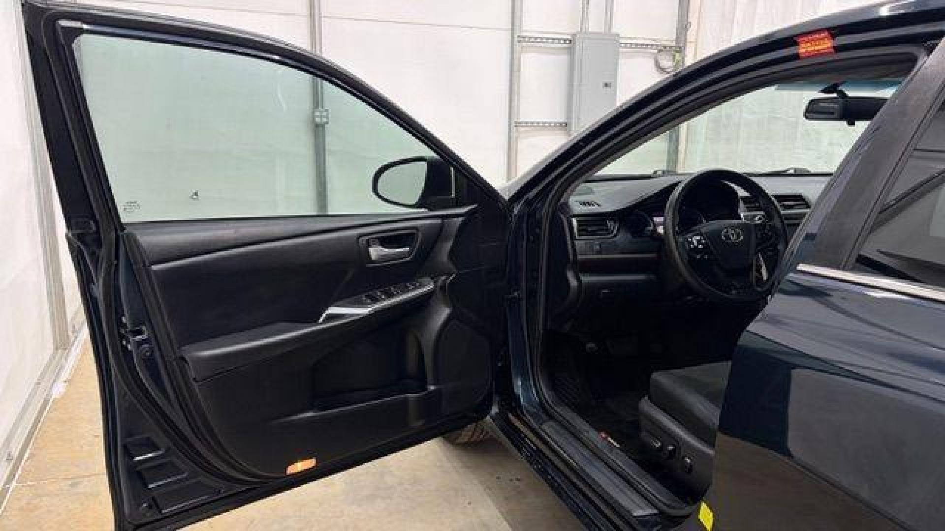2017 Blue Toyota Camry LE (4T1BF1FKXHU) with an 2.5L I-4 DOHC engine, located at 1806 Veterans Memorial Hwy SW, Austell, GA, 30168, (770) 944-9558, 33.817959, -84.606987- Photo#10