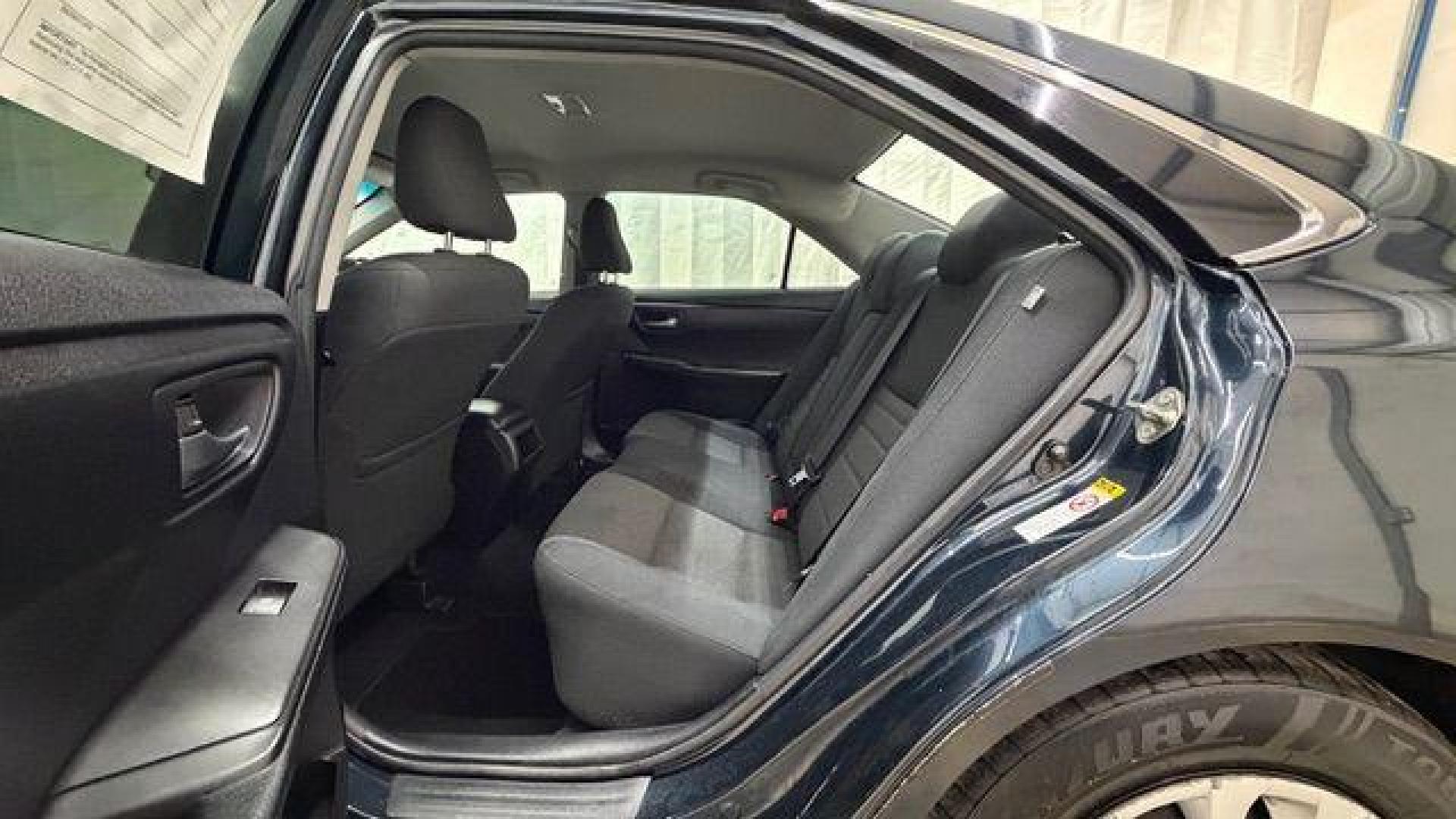 2017 Blue Toyota Camry LE (4T1BF1FKXHU) with an 2.5L I-4 DOHC engine, located at 1806 Veterans Memorial Hwy SW, Austell, GA, 30168, (770) 944-9558, 33.817959, -84.606987- Photo#14