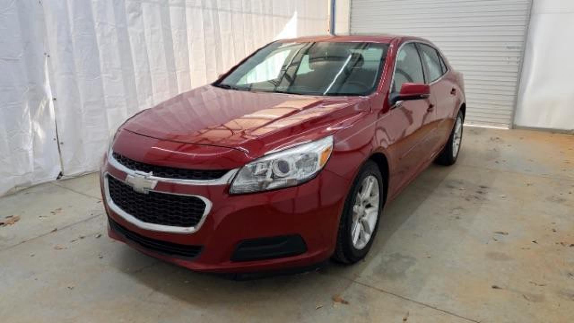 2014 Red Chevrolet Malibu 1LT (1G11C5SL3EF) with an ECOTEC 2.5L I-4 gasoline direct injection engine, located at 1806 Veterans Memorial Hwy SW, Austell, GA, 30168, (770) 944-9558, 33.817959, -84.606987 - Photo#0