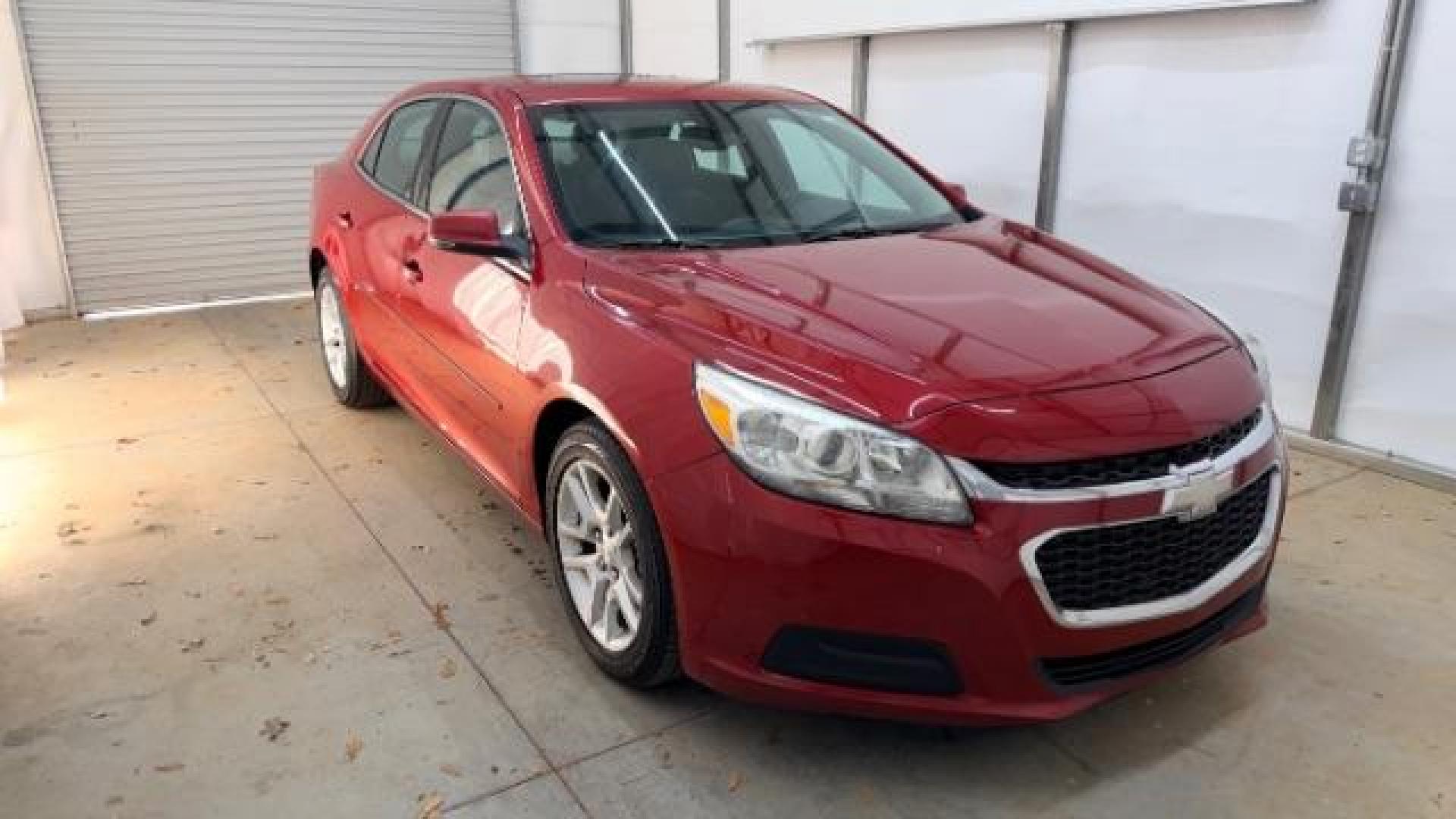 2014 Red Chevrolet Malibu 1LT (1G11C5SL3EF) with an ECOTEC 2.5L I-4 gasoline direct injection engine, located at 1806 Veterans Memorial Hwy SW, Austell, GA, 30168, (770) 944-9558, 33.817959, -84.606987 - Photo#9