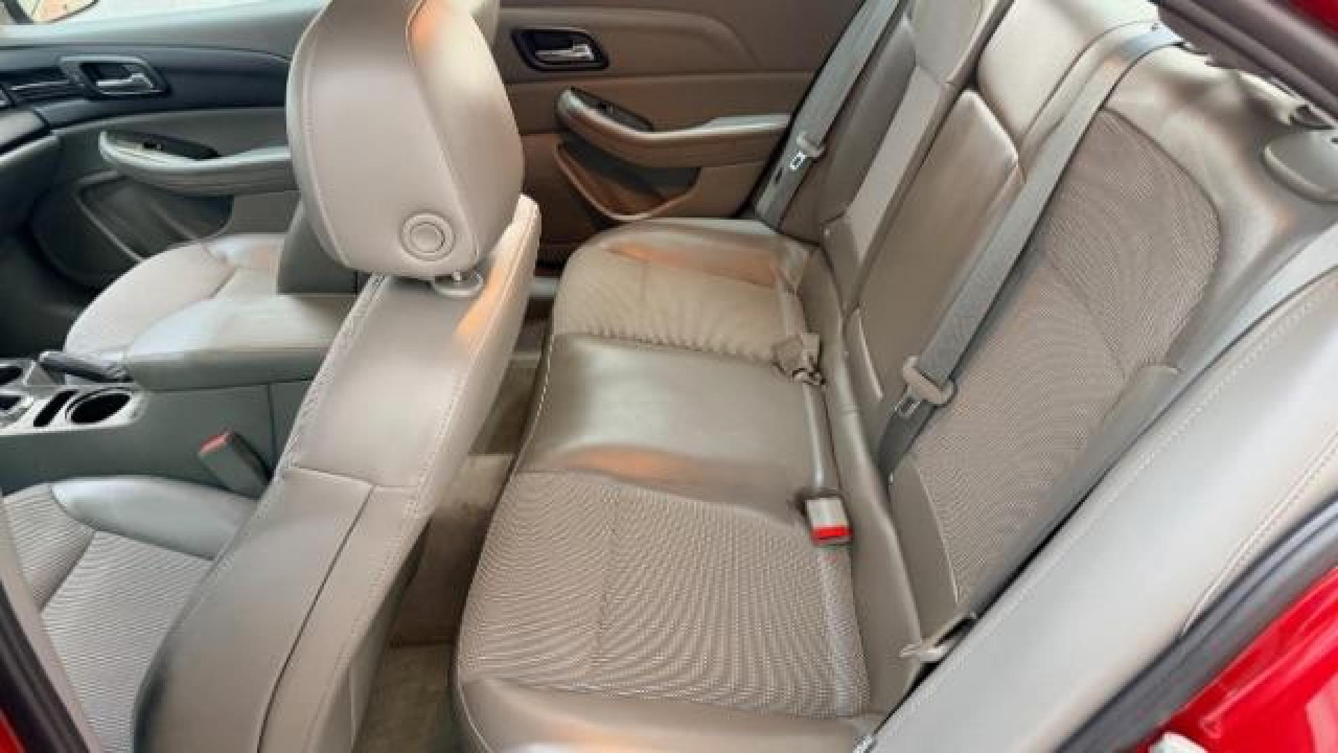 2014 Red Chevrolet Malibu 1LT (1G11C5SL3EF) with an ECOTEC 2.5L I-4 gasoline direct injection engine, located at 1806 Veterans Memorial Hwy SW, Austell, GA, 30168, (770) 944-9558, 33.817959, -84.606987 - Photo#13