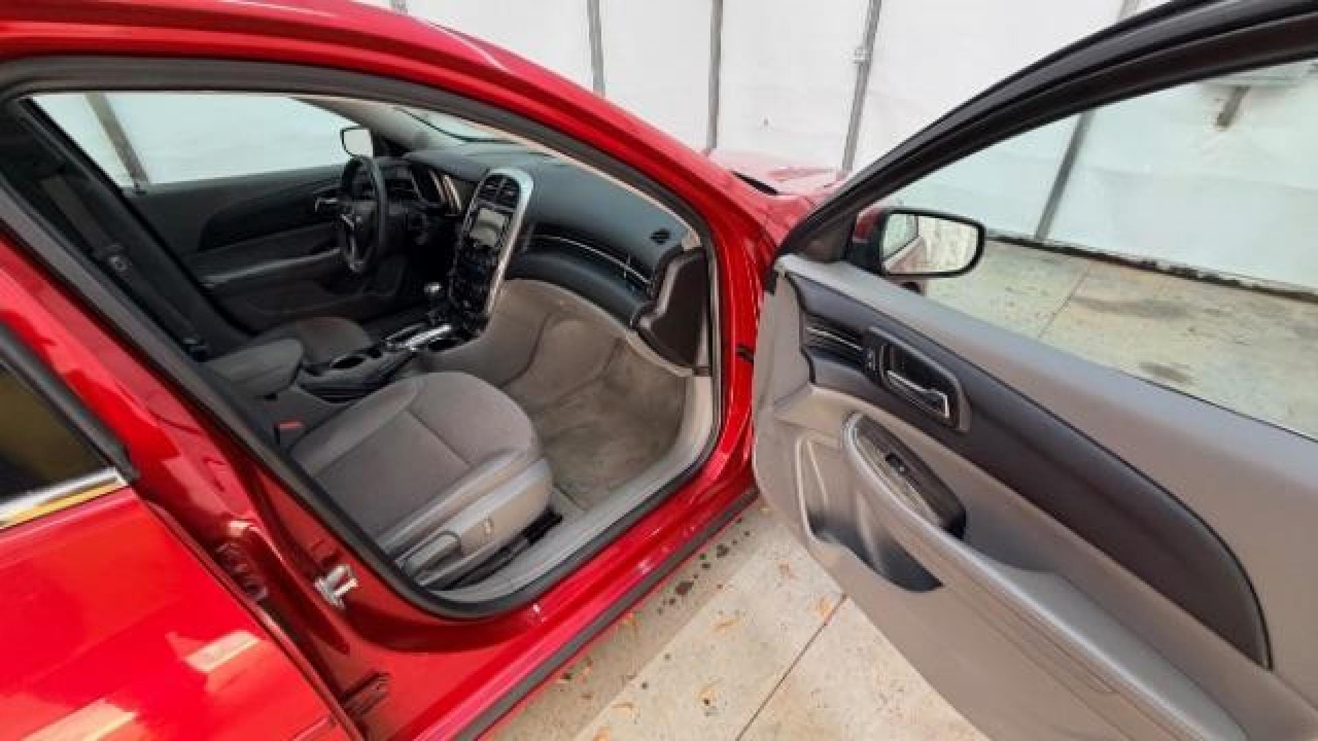 2014 Red Chevrolet Malibu 1LT (1G11C5SL3EF) with an ECOTEC 2.5L I-4 gasoline direct injection engine, located at 1806 Veterans Memorial Hwy SW, Austell, GA, 30168, (770) 944-9558, 33.817959, -84.606987 - Photo#18