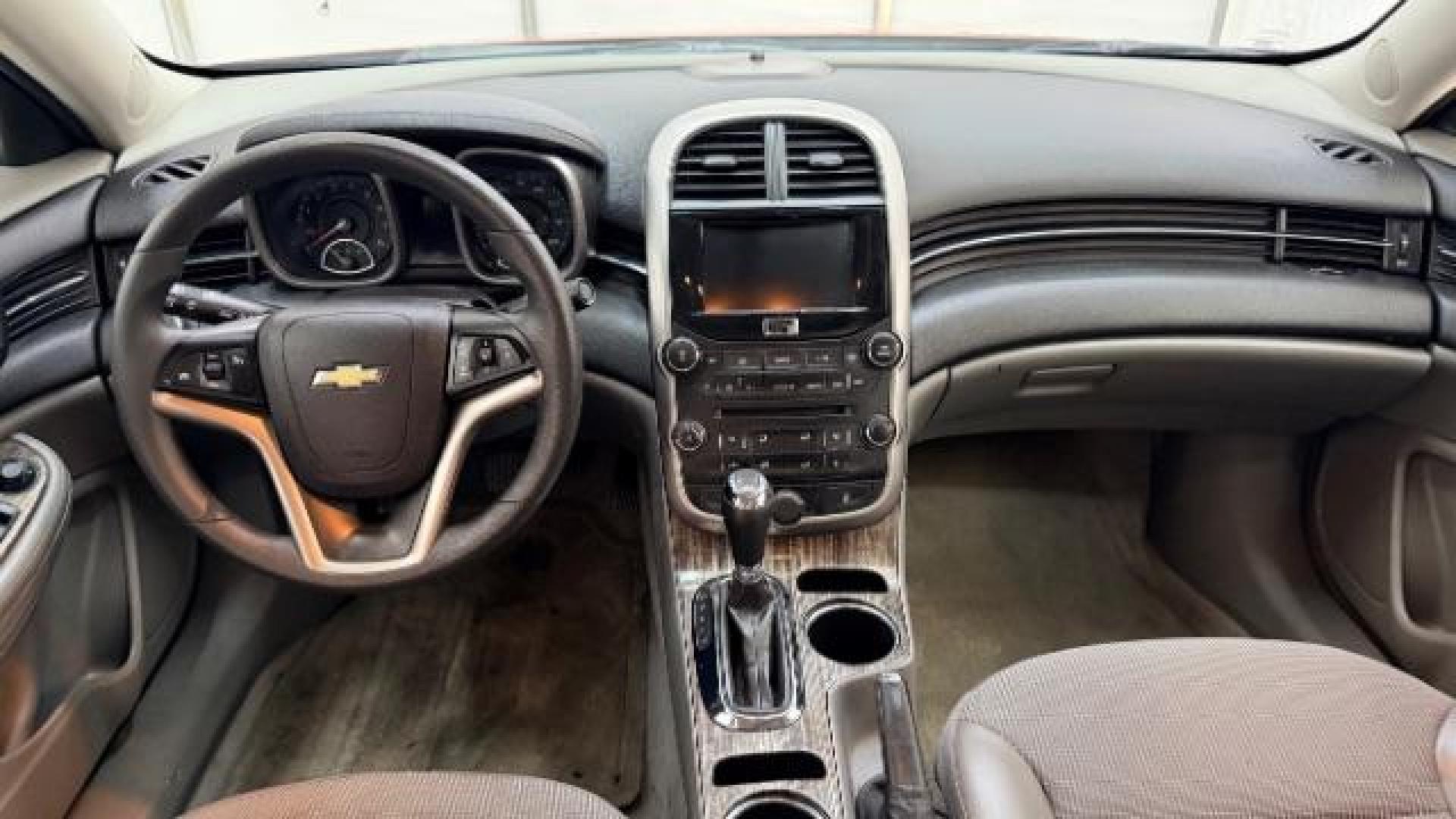 2014 Red Chevrolet Malibu 1LT (1G11C5SL3EF) with an ECOTEC 2.5L I-4 gasoline direct injection engine, located at 1806 Veterans Memorial Hwy SW, Austell, GA, 30168, (770) 944-9558, 33.817959, -84.606987 - Photo#24