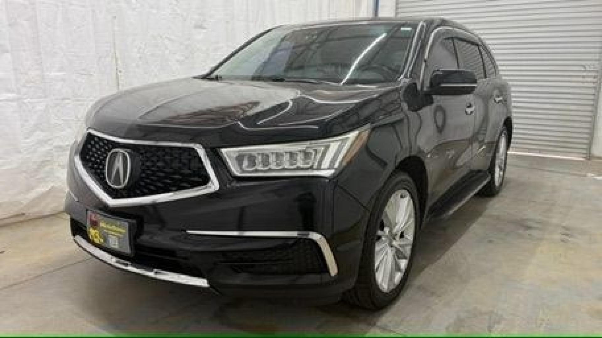 2017 Black Acura MDX w/Technology Package (5FRYD4H54HB) with an 3.5L V-6 gasoline direct injection engine, located at 1806 Veterans Memorial Hwy SW, Austell, GA, 30168, (770) 944-9558, 33.817959, -84.606987- Photo#0
