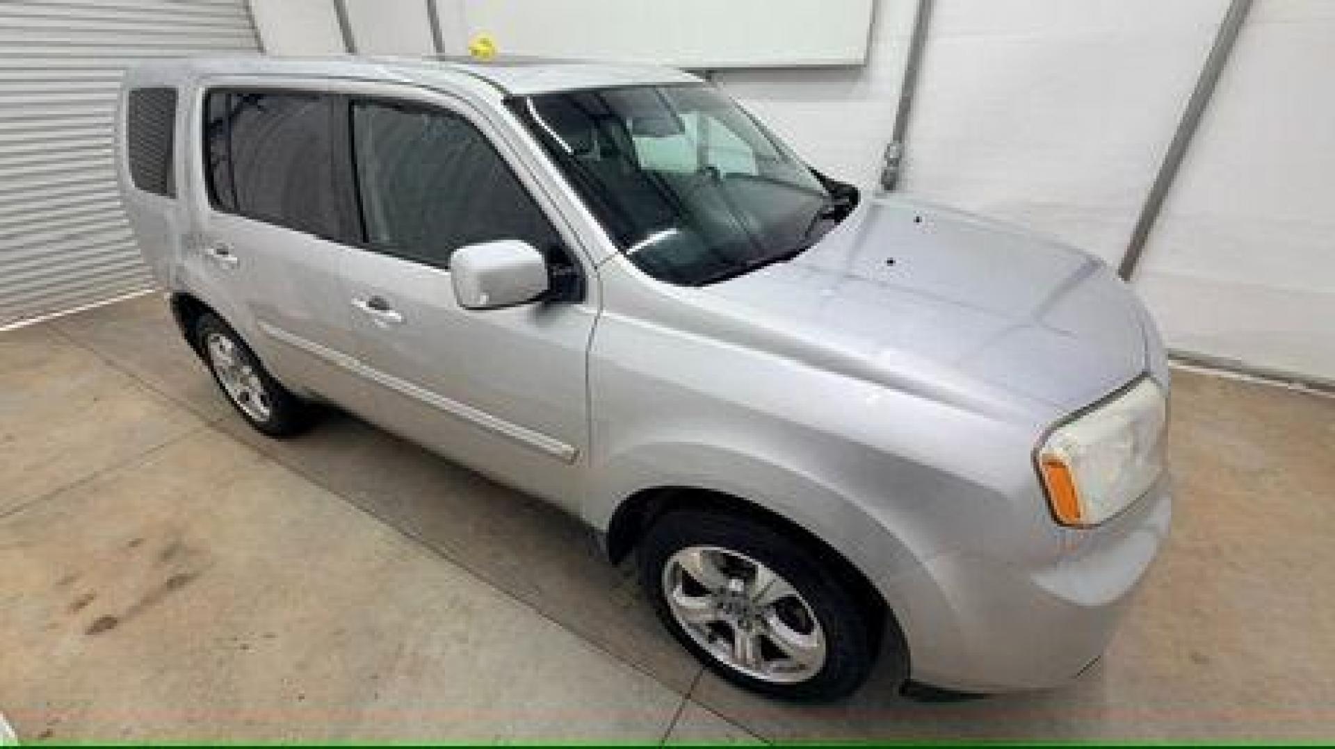 2012 Silver Honda Pilot EX-L (5FNYF3H65CB) with an 3.5L V-6 i-VTEC VCM variable valve control engine, located at 1806 Veterans Memorial Hwy SW, Austell, GA, 30168, (770) 944-9558, 33.817959, -84.606987 - Photo#7