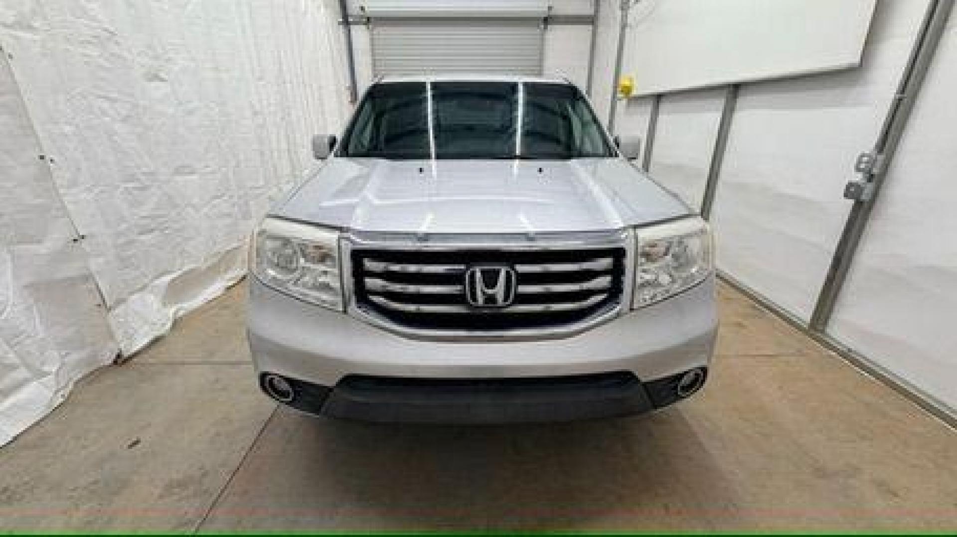 2012 Silver Honda Pilot EX-L (5FNYF3H65CB) with an 3.5L V-6 i-VTEC VCM variable valve control engine, located at 1806 Veterans Memorial Hwy SW, Austell, GA, 30168, (770) 944-9558, 33.817959, -84.606987 - Photo#9