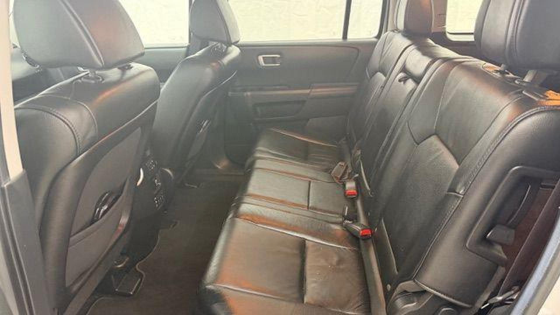 2012 Silver Honda Pilot EX-L (5FNYF3H65CB) with an 3.5L V-6 i-VTEC VCM variable valve control engine, located at 1806 Veterans Memorial Hwy SW, Austell, GA, 30168, (770) 944-9558, 33.817959, -84.606987 - Photo#15