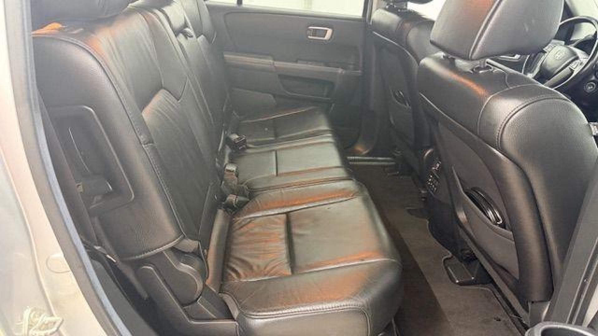 2012 Silver Honda Pilot EX-L (5FNYF3H65CB) with an 3.5L V-6 i-VTEC VCM variable valve control engine, located at 1806 Veterans Memorial Hwy SW, Austell, GA, 30168, (770) 944-9558, 33.817959, -84.606987 - Photo#17