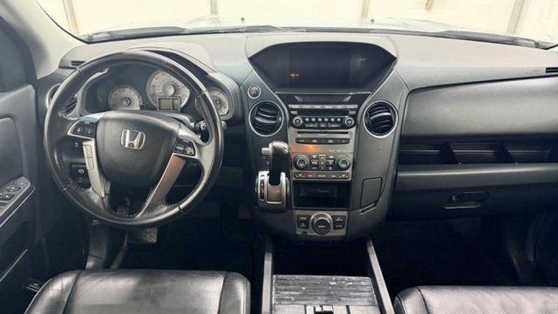 2012 Silver Honda Pilot EX-L (5FNYF3H65CB) with an 3.5L V-6 i-VTEC VCM variable valve control engine, located at 1806 Veterans Memorial Hwy SW, Austell, GA, 30168, (770) 944-9558, 33.817959, -84.606987 - Photo#20