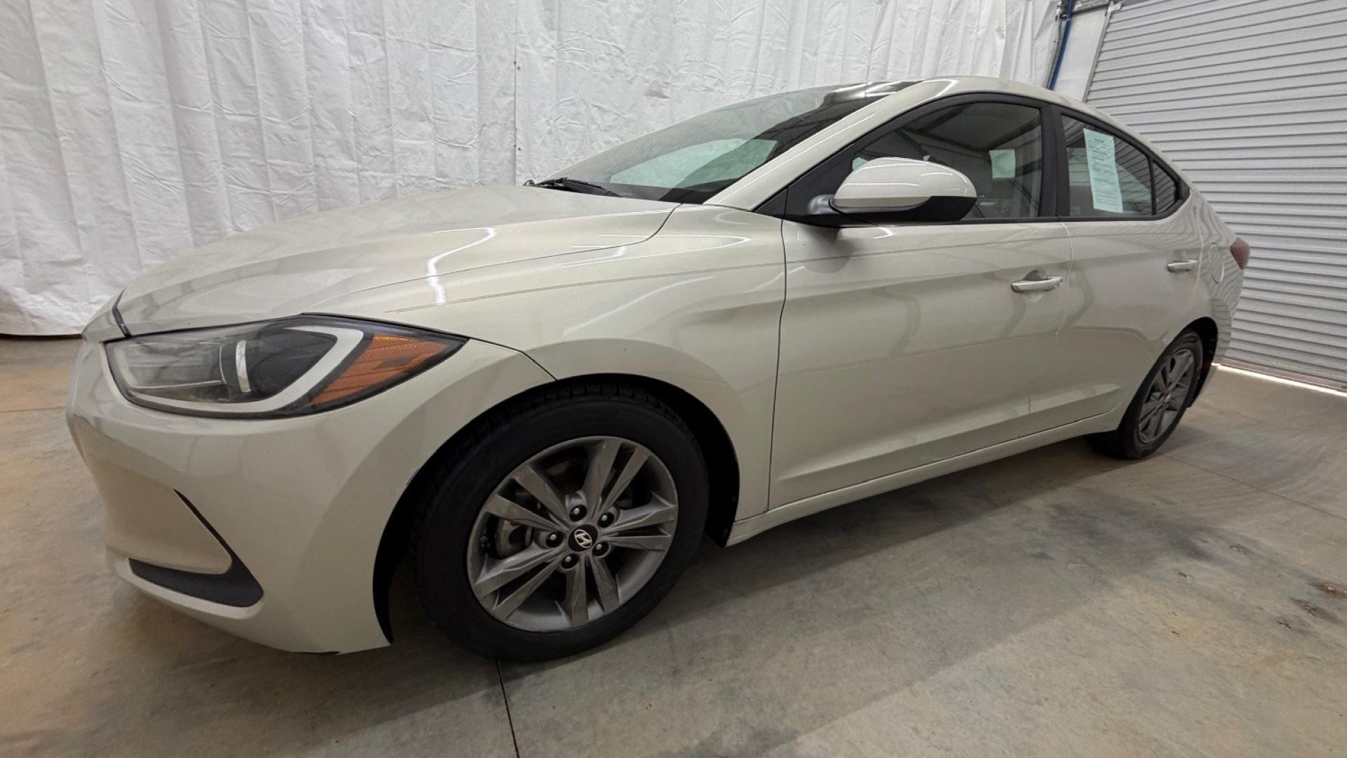 2017 TAN Hyundai Elantra SE (5NPD84LF0HH) with an Nu 2L I-4 DOHC engine, located at 1806 Veterans Memorial Hwy SW, Austell, GA, 30168, (770) 944-9558, 33.817959, -84.606987 - Photo#1