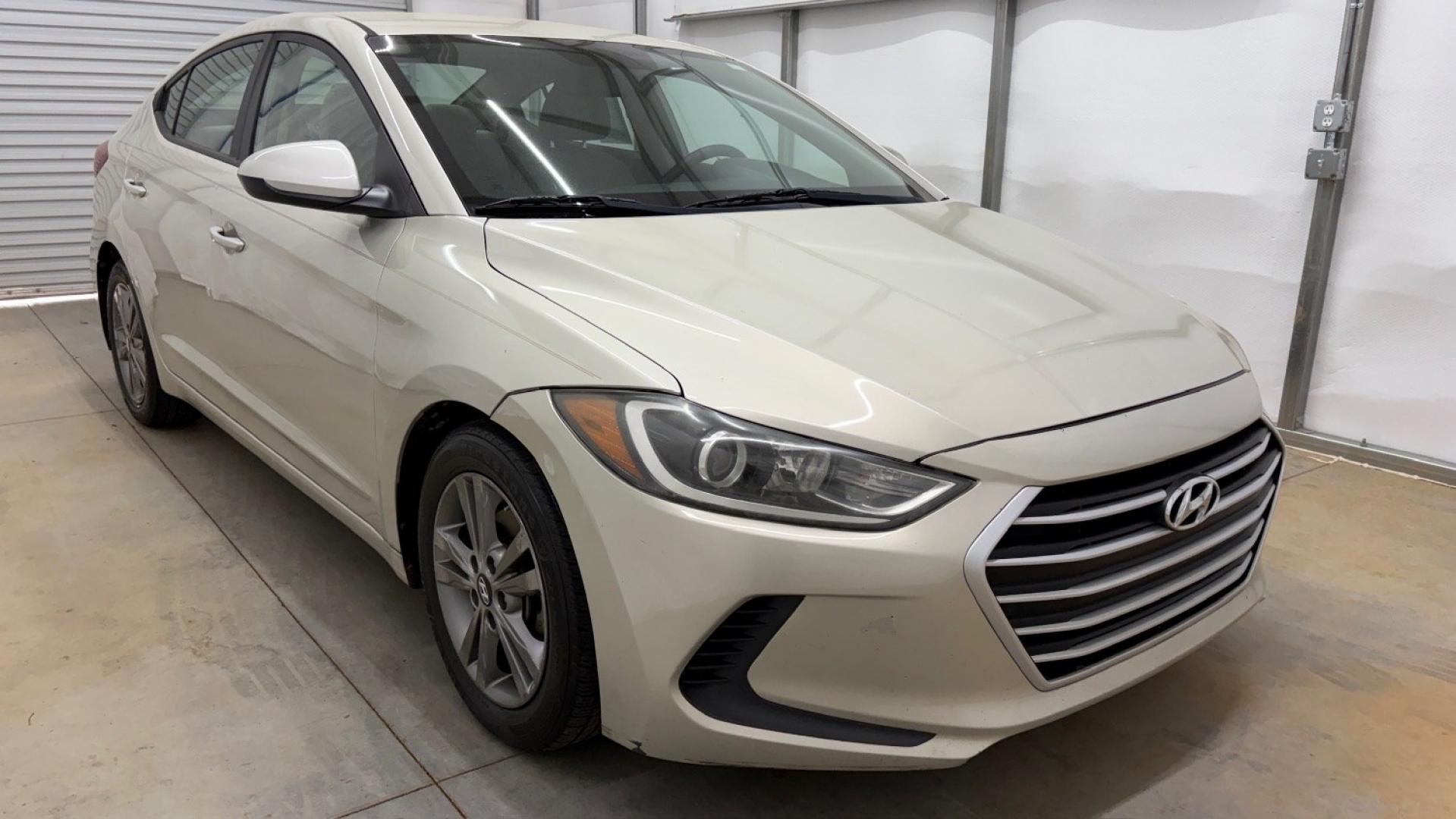 2017 TAN Hyundai Elantra SE (5NPD84LF0HH) with an Nu 2L I-4 DOHC engine, located at 1806 Veterans Memorial Hwy SW, Austell, GA, 30168, (770) 944-9558, 33.817959, -84.606987 - Photo#8
