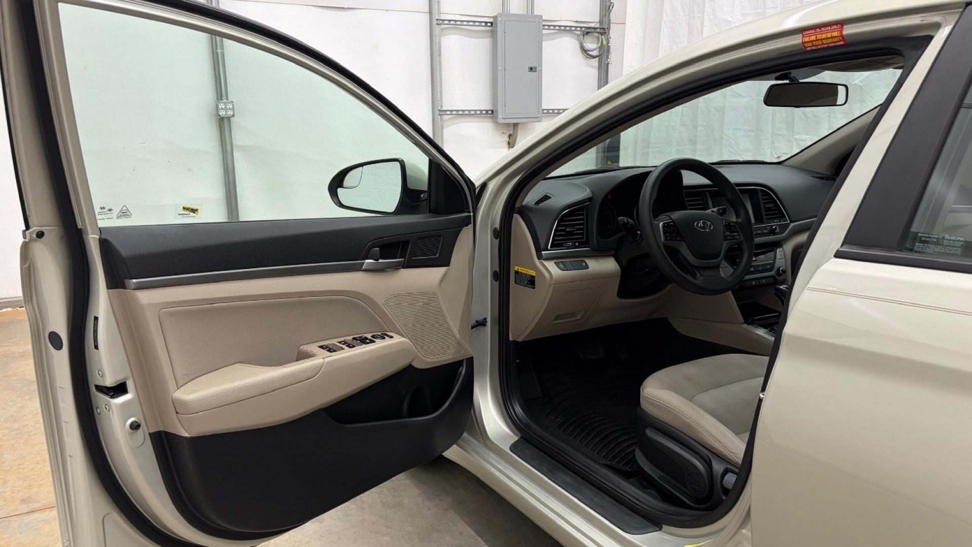 2017 TAN Hyundai Elantra SE (5NPD84LF0HH) with an Nu 2L I-4 DOHC engine, located at 1806 Veterans Memorial Hwy SW, Austell, GA, 30168, (770) 944-9558, 33.817959, -84.606987 - Photo#10