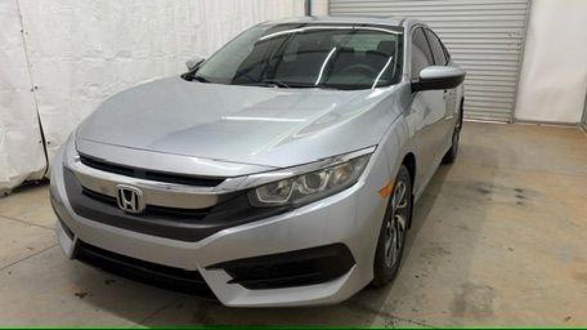 2016 Silver Honda Civic EX (19XFC2F70GE) with an 2L I-4 DOHC engine, located at 1806 Veterans Memorial Hwy SW, Austell, GA, 30168, (770) 944-9558, 33.817959, -84.606987 - Photo#0