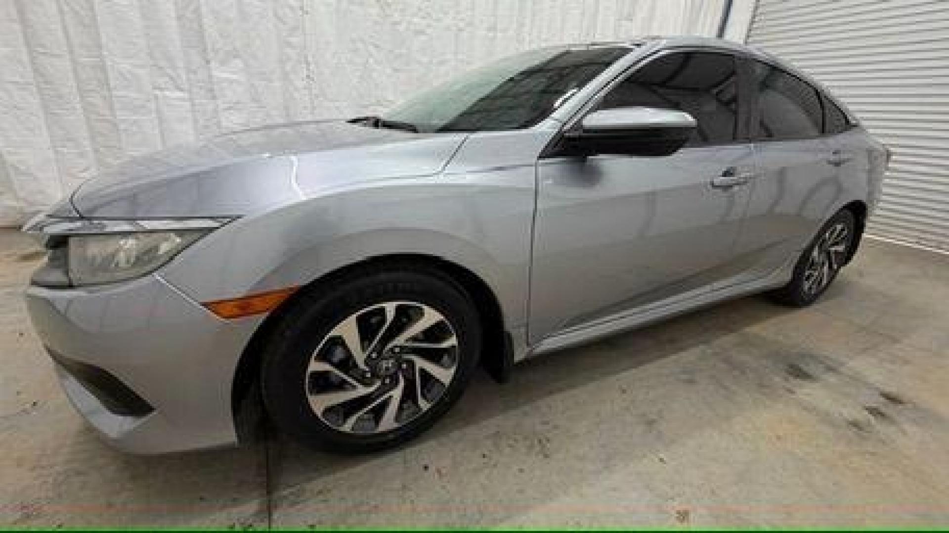 2016 Silver Honda Civic EX (19XFC2F70GE) with an 2L I-4 DOHC engine, located at 1806 Veterans Memorial Hwy SW, Austell, GA, 30168, (770) 944-9558, 33.817959, -84.606987 - Photo#1