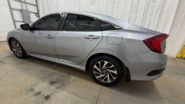 2016 Silver Honda Civic EX (19XFC2F70GE) with an 2L I-4 DOHC engine, located at 1806 Veterans Memorial Hwy SW, Austell, GA, 30168, (770) 944-9558, 33.817959, -84.606987 - Photo#2