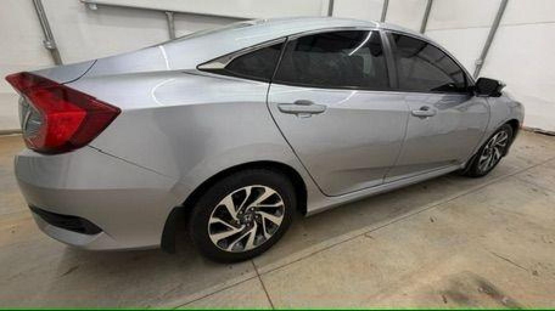 2016 Silver Honda Civic EX (19XFC2F70GE) with an 2L I-4 DOHC engine, located at 1806 Veterans Memorial Hwy SW, Austell, GA, 30168, (770) 944-9558, 33.817959, -84.606987 - Photo#6