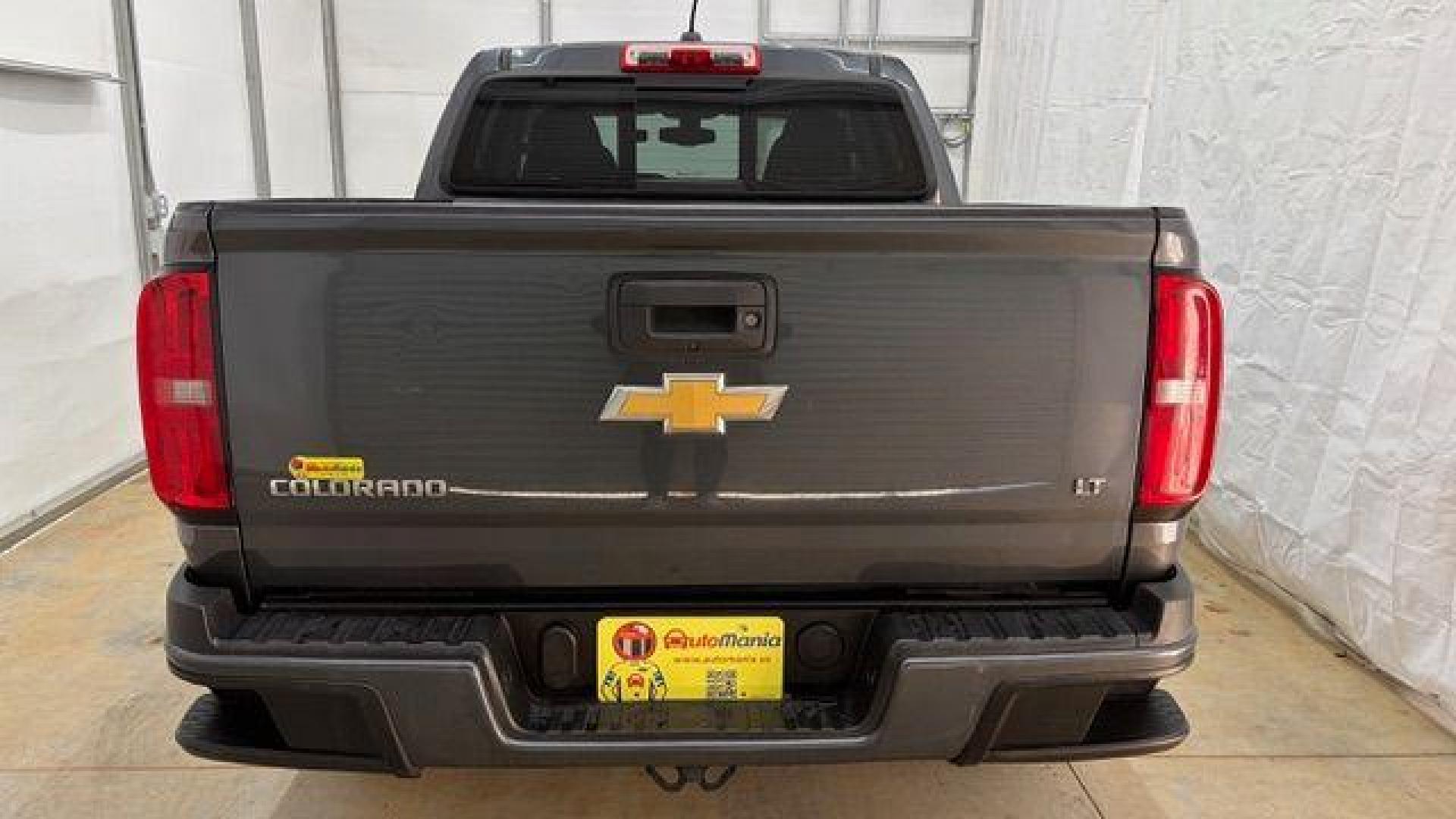 2016 Gray Chevrolet Colorado LT (1GCGSCEA2G1) with an 3.6L V-6 gasoline direct injection engine, located at 1806 Veterans Memorial Hwy SW, Austell, GA, 30168, (770) 944-9558, 33.817959, -84.606987 - Photo#4