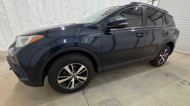 2017 Blue Toyota RAV4 XLE (2T3WFREV0HW) with an 2.5L I-4 DOHC engine, located at 1806 Veterans Memorial Hwy SW, Austell, GA, 30168, (770) 944-9558, 33.817959, -84.606987 - Photo#2
