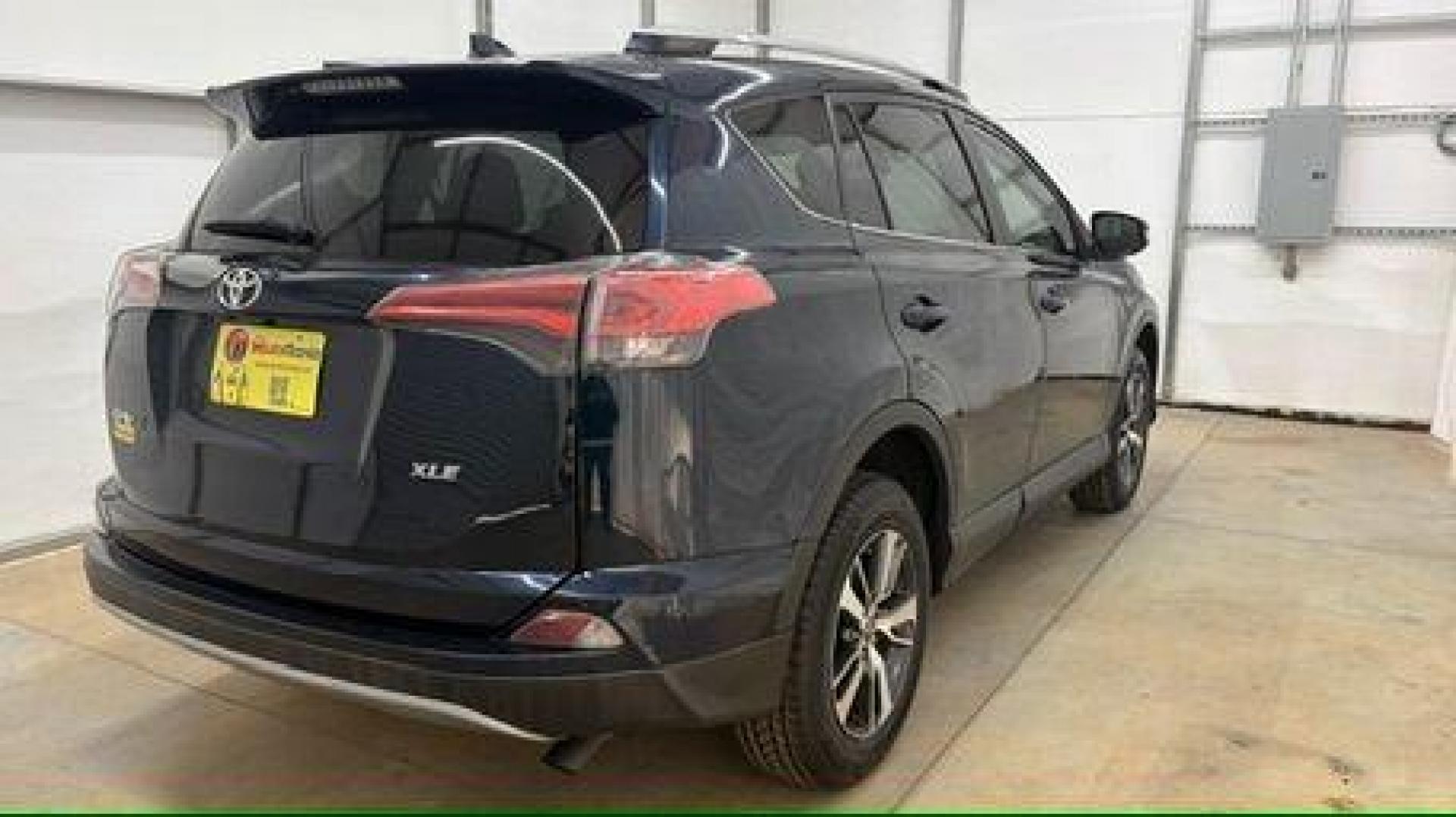 2017 Blue Toyota RAV4 XLE (2T3WFREV0HW) with an 2.5L I-4 DOHC engine, located at 1806 Veterans Memorial Hwy SW, Austell, GA, 30168, (770) 944-9558, 33.817959, -84.606987 - Photo#6
