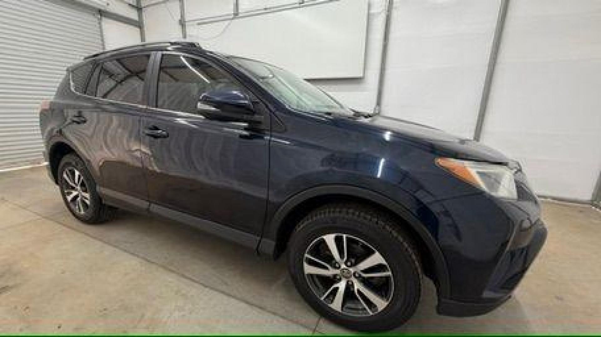 2017 Blue Toyota RAV4 XLE (2T3WFREV0HW) with an 2.5L I-4 DOHC engine, located at 1806 Veterans Memorial Hwy SW, Austell, GA, 30168, (770) 944-9558, 33.817959, -84.606987 - Photo#8