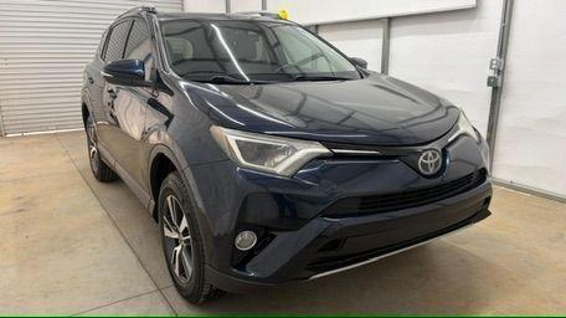 2017 Blue Toyota RAV4 XLE (2T3WFREV0HW) with an 2.5L I-4 DOHC engine, located at 1806 Veterans Memorial Hwy SW, Austell, GA, 30168, (770) 944-9558, 33.817959, -84.606987 - Photo#9