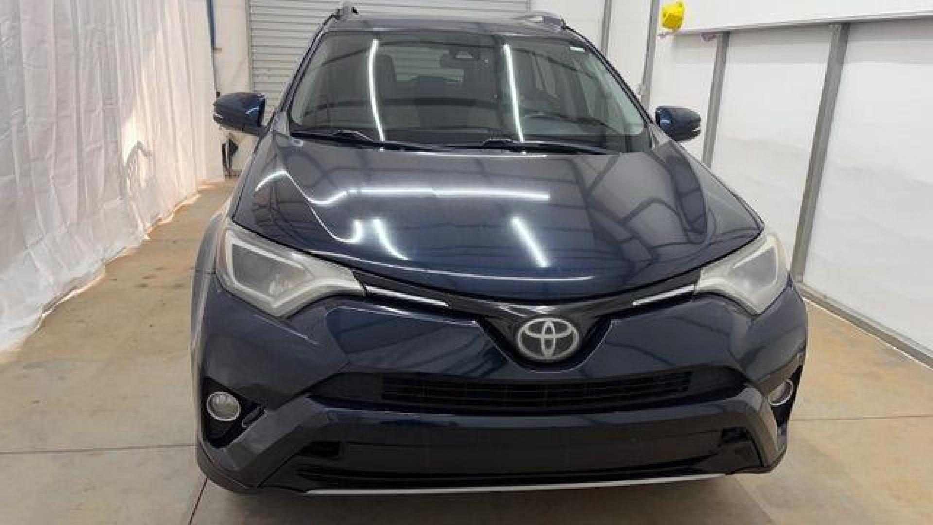 2017 Blue Toyota RAV4 XLE (2T3WFREV0HW) with an 2.5L I-4 DOHC engine, located at 1806 Veterans Memorial Hwy SW, Austell, GA, 30168, (770) 944-9558, 33.817959, -84.606987 - Photo#10