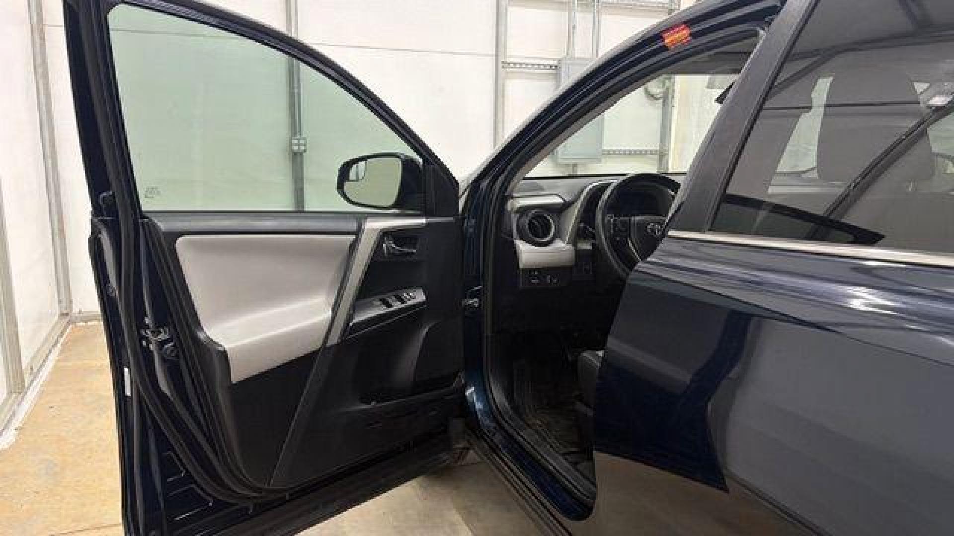 2017 Blue Toyota RAV4 XLE (2T3WFREV0HW) with an 2.5L I-4 DOHC engine, located at 1806 Veterans Memorial Hwy SW, Austell, GA, 30168, (770) 944-9558, 33.817959, -84.606987 - Photo#11