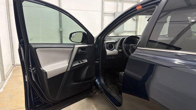 2017 Blue Toyota RAV4 XLE (2T3WFREV0HW) with an 2.5L I-4 DOHC engine, located at 1806 Veterans Memorial Hwy SW, Austell, GA, 30168, (770) 944-9558, 33.817959, -84.606987 - Photo#11