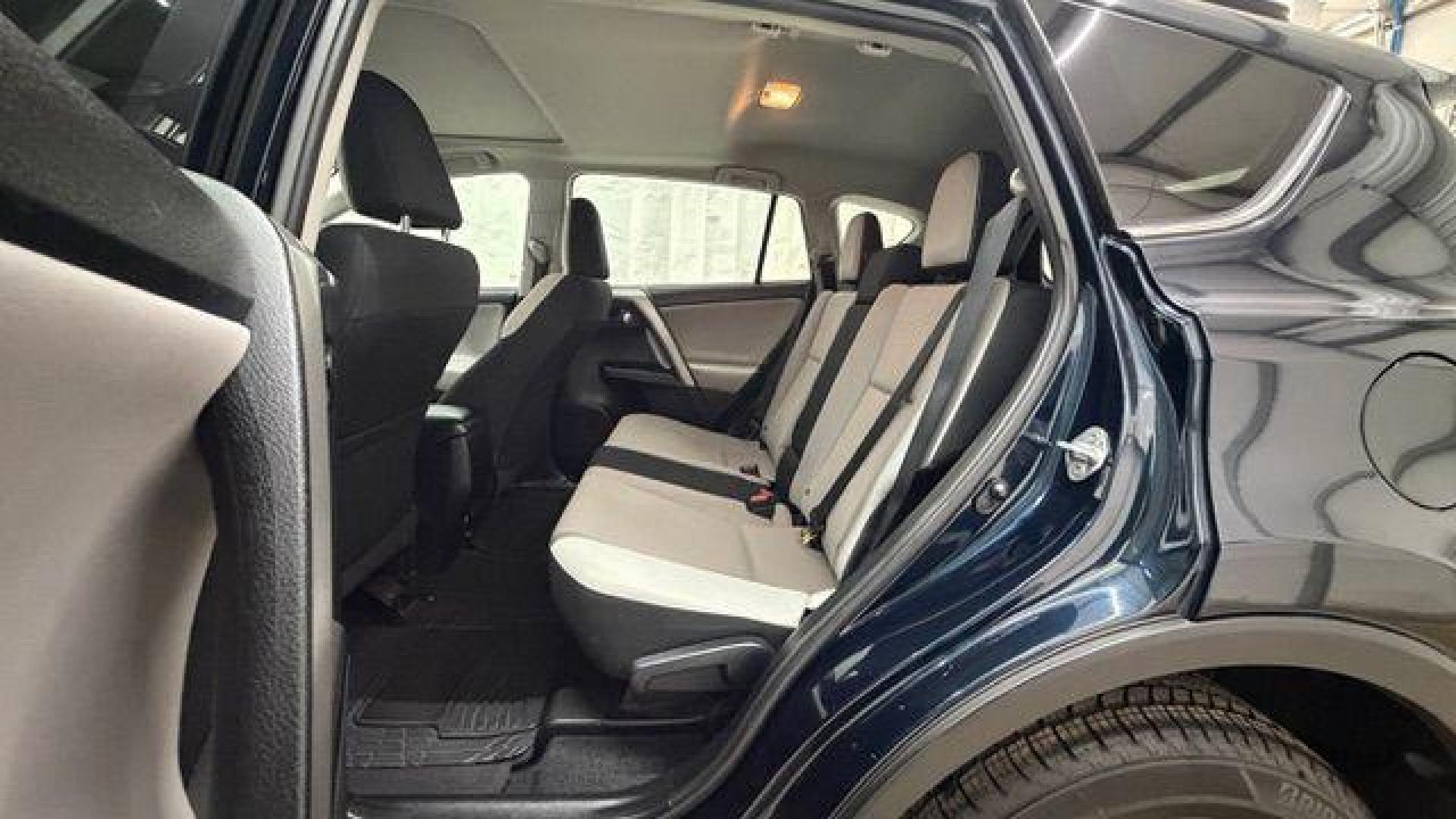 2017 Blue Toyota RAV4 XLE (2T3WFREV0HW) with an 2.5L I-4 DOHC engine, located at 1806 Veterans Memorial Hwy SW, Austell, GA, 30168, (770) 944-9558, 33.817959, -84.606987 - Photo#15