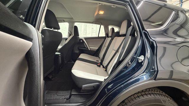 2017 Blue Toyota RAV4 XLE (2T3WFREV0HW) with an 2.5L I-4 DOHC engine, located at 1806 Veterans Memorial Hwy SW, Austell, GA, 30168, (770) 944-9558, 33.817959, -84.606987 - Photo#15