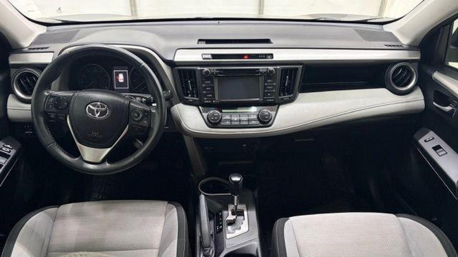 2017 Blue Toyota RAV4 XLE (2T3WFREV0HW) with an 2.5L I-4 DOHC engine, located at 1806 Veterans Memorial Hwy SW, Austell, GA, 30168, (770) 944-9558, 33.817959, -84.606987 - Photo#16