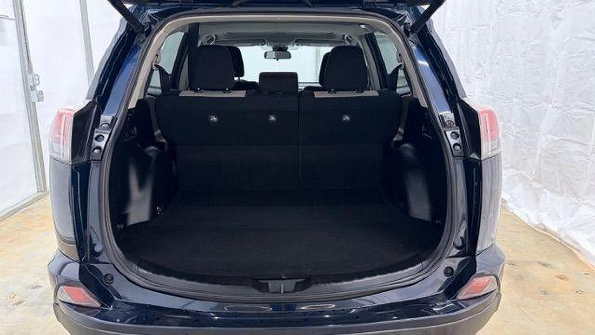 2017 Blue Toyota RAV4 XLE (2T3WFREV0HW) with an 2.5L I-4 DOHC engine, located at 1806 Veterans Memorial Hwy SW, Austell, GA, 30168, (770) 944-9558, 33.817959, -84.606987 - Photo#17