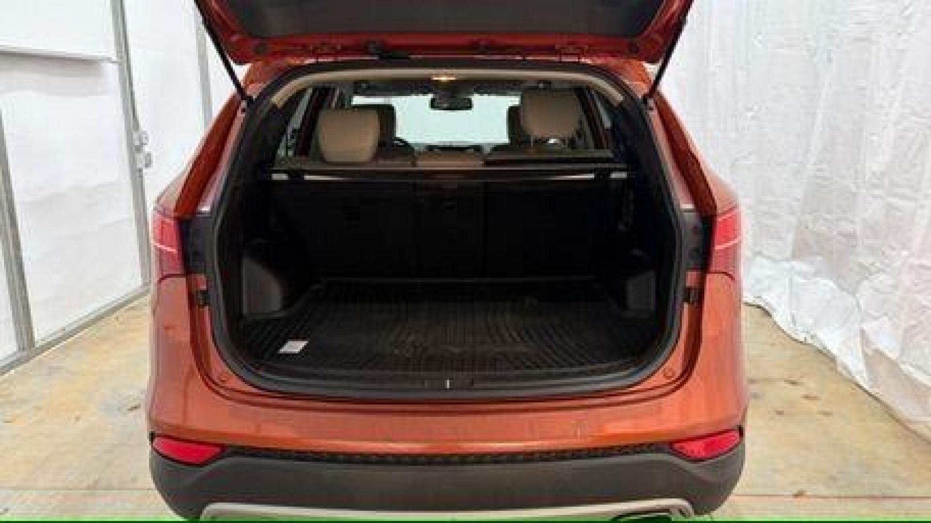 2014 Orange Hyundai Santa Fe Sport 2.4L (5XYZU3LB0EG) with an Theta II 2.4L I-4 gasoline direct injection engine, located at 1806 Veterans Memorial Hwy SW, Austell, GA, 30168, (770) 944-9558, 33.817959, -84.606987 - Photo#5