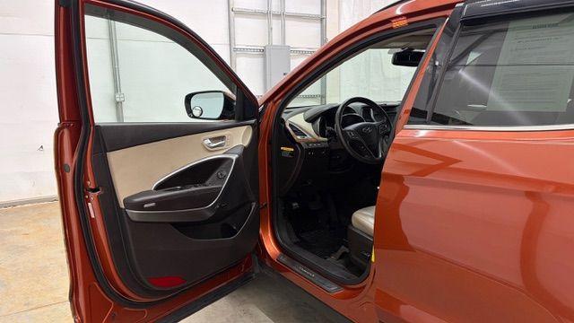 2014 Orange Hyundai Santa Fe Sport 2.4L (5XYZU3LB0EG) with an Theta II 2.4L I-4 gasoline direct injection engine, located at 1806 Veterans Memorial Hwy SW, Austell, GA, 30168, (770) 944-9558, 33.817959, -84.606987 - Photo#11