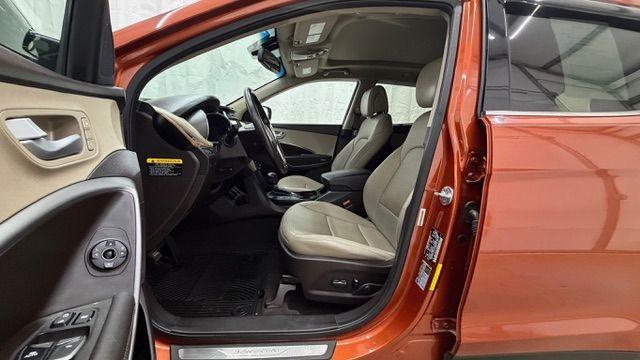 2014 Orange Hyundai Santa Fe Sport 2.4L (5XYZU3LB0EG) with an Theta II 2.4L I-4 gasoline direct injection engine, located at 1806 Veterans Memorial Hwy SW, Austell, GA, 30168, (770) 944-9558, 33.817959, -84.606987 - Photo#13