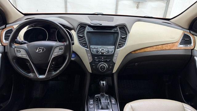 2014 Orange Hyundai Santa Fe Sport 2.4L (5XYZU3LB0EG) with an Theta II 2.4L I-4 gasoline direct injection engine, located at 1806 Veterans Memorial Hwy SW, Austell, GA, 30168, (770) 944-9558, 33.817959, -84.606987 - Photo#16